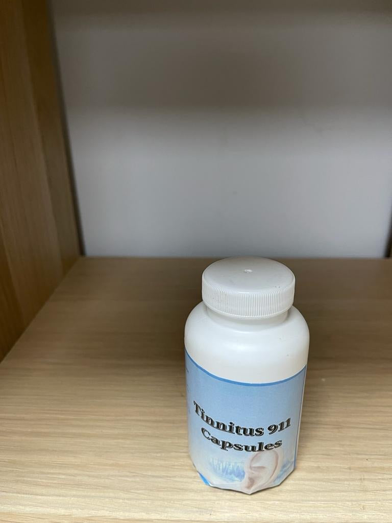 Tinnitus 911 Capsules 120 Capsule (Relives Ear Ringing | Excellent Remedy for Ear-Ache) on a wooden shelf